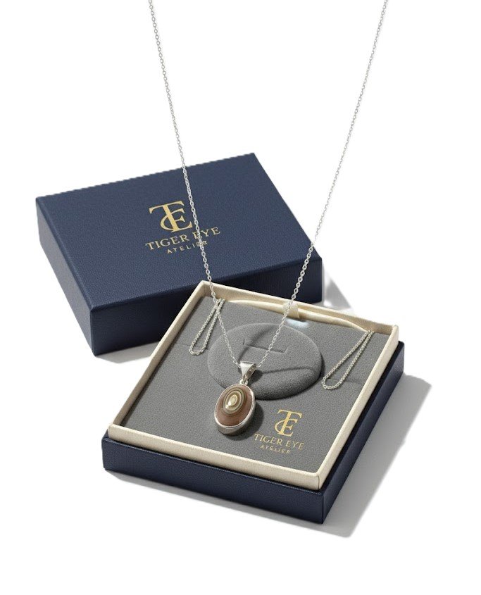 concentric banded yemeni aqeeq sterling silver pendant (tiger's eye) concentric banded yemeni aqeeq sterling silver pendant (tiger's eye)